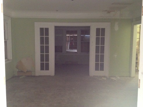 The dining room. Though those french doors lead to the porch/sunroom that has to be torn off.