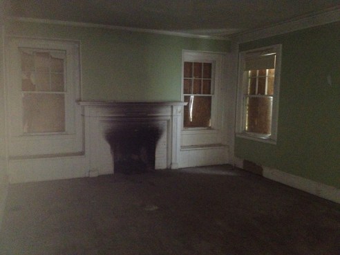 The livingroom. Yes, the fireplace needs some work. No fires for a while :-)