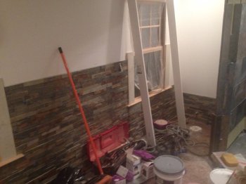 The stackstone tile going up on the walls of the master bathroom. It won't be everywhere, just an accent wall. 